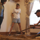 Looking at floor: Sherry Walls, family friend Clay Pemberton and Fusion’s Natasha del Toro during a shoot for the forthcoming documentary Wasteland, in the Walls residence. Photo: The Naked Truth